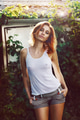 Genuine redhead woman in sun rays - PhotoDune Item for Sale