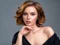Beautiful brown haired with stylish short hairstyle. Woman with a curly hair. - PhotoDune Item for Sale