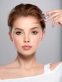 Woman getting cosmetic injection of botox in forehead, closeup. Woman in beauty salon - PhotoDune Item for Sale