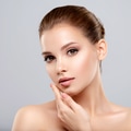 Closeup portrait of a face of the young pretty girl with a healthy skin. - PhotoDune Item for Sale