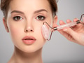 Pretty white model caring of face. Beauty treatment concept. Skin care concept. - PhotoDune Item for Sale