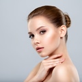 Closeup portrait of a face of the young pretty girl with a healthy skin. - PhotoDune Item for Sale