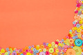 Colourful buttons on an orange background with copy space. - PhotoDune Item for Sale