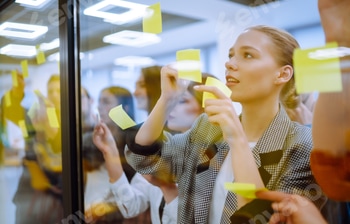 Young business team people brainstorm on corporate project together write strategy tasks