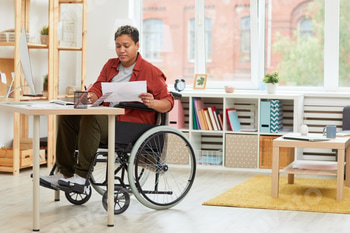 Disabled woman working at her workplace