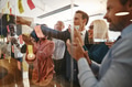 Smiling businesspeople clapping after a brainstorming session in an office - PhotoDune Item for Sale