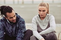 Young couple catching their breath while out for a run - PhotoDune Item for Sale