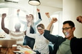 Ecstatic group of diverse coworkers cheering together in an office - PhotoDune Item for Sale