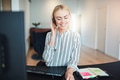 Businesswoman working at her desk and talking on a headset - PhotoDune Item for Sale