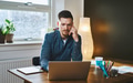 Worried entrepreneur young man working at desk - PhotoDune Item for Sale