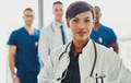 Black female doctor leading medical team - PhotoDune Item for Sale