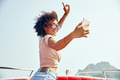 Smiling young woman taking selfies on a boat - PhotoDune Item for Sale