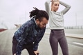 Young couple catching their breath after a run - PhotoDune Item for Sale