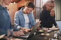 Diverse businesspeople working together at a table in an office - PhotoDune Item for Sale