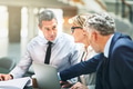 Mature business executives meeting together in a modern office - PhotoDune Item for Sale