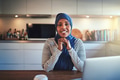 Smiling young Arabic female entrepreneur working in her kitchen - PhotoDune Item for Sale