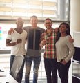 Friends smiling and standing together in office - PhotoDune Item for Sale