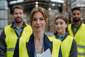 Full team of warehouse employees standing in warehouse. Team of workers in reflective clothing in - PhotoDune Item for Sale