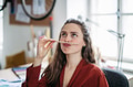 Portrait of funny woman with pencil in mouth, having fun at work. - PhotoDune Item for Sale