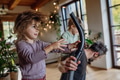 Father and son vacuuming girl's hair with vacuum cleaner. Father with kids cleaning house, helping - PhotoDune Item for Sale
