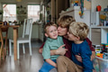 Father hugging and kissing son's cheeks. Concept of Father's Day, and fatherly love. - PhotoDune Item for Sale