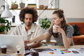 Young colleagues working together in photo atelier. - PhotoDune Item for Sale