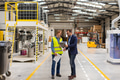Supervisor, manager scolding employee in modern industry factory. Worker making mistake. Production - PhotoDune Item for Sale
