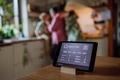 Close up of smart thermostat at home, adjusting, lowering heating temperature at home. Concept of - PhotoDune Item for Sale