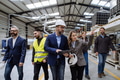 Full team of warehouse employees walking in warehouse. Team of workers, managers, female director in - PhotoDune Item for Sale