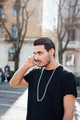 A young italian boy using a smartphone - PhotoDune Item for Sale