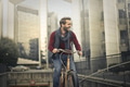 Man cycling in an urban context - PhotoDune Item for Sale