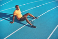 Young athlete relaxing taking a break before a run - PhotoDune Item for Sale
