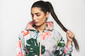 Pretty thoughtful woman holding her long hair and looking away - PhotoDune Item for Sale