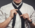 Young businessman tying his necktie for the business day - PhotoDune Item for Sale