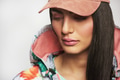 Young woman with long hair posing in casual outfit - PhotoDune Item for Sale