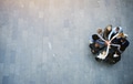 United colleagues standing in a huddle with their hands together - PhotoDune Item for Sale