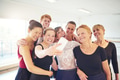 Group of smiling women taking selfies in a dance studio - PhotoDune Item for Sale