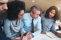 Diverse work colleagues talking business together in a modern office - PhotoDune Item for Sale