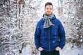 Young smiling man wearing coat in winter - PhotoDune Item for Sale