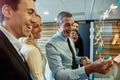 Cheerful business team discussing project in office. - PhotoDune Item for Sale
