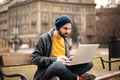 Man using a laptop outdoor - PhotoDune Item for Sale
