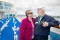 Senior Adult Couple Enjoying The View From Their Passenger Cruise Ship with Their Bonoculars. - PhotoDune Item for Sale