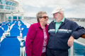 Senior Adult Couple Enjoying The View From Their Passenger Cruise Ship Railing. - PhotoDune Item for Sale