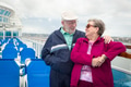 Senior Adult Couple Enjoying The View From Their Passenger Cruise Ship Railing. - PhotoDune Item for Sale