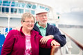 Senior Adult Couple Enjoying The View From Their Passenger Cruise Ship Railing. - PhotoDune Item for Sale