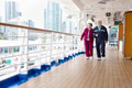 Happy Senior Couple Walking The Deck of a Luxury Passenger Cruise Ship. - PhotoDune Item for Sale