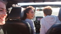 Close Up Of Group Of Young Friends On Road Trip Driving In Convertible Car - PhotoDune Item for Sale