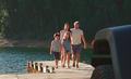 Family On Road Trip In Convertible Car Walking Along Wooden Jetty By Lake - PhotoDune Item for Sale