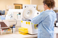 Scientist Using PCR Machine In Laboratory - PhotoDune Item for Sale