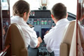 Pilot And Copilot In Private Jet Cockpit - PhotoDune Item for Sale